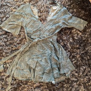 Princess polly green romper, size 8.